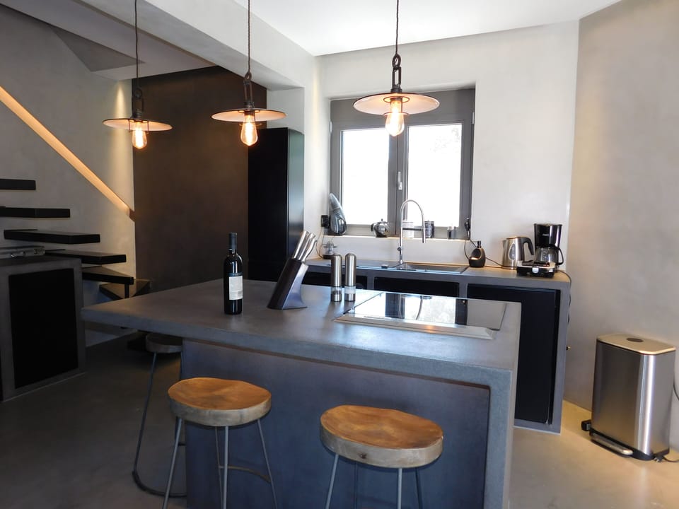 Boutique House kitchen with breakfast island.