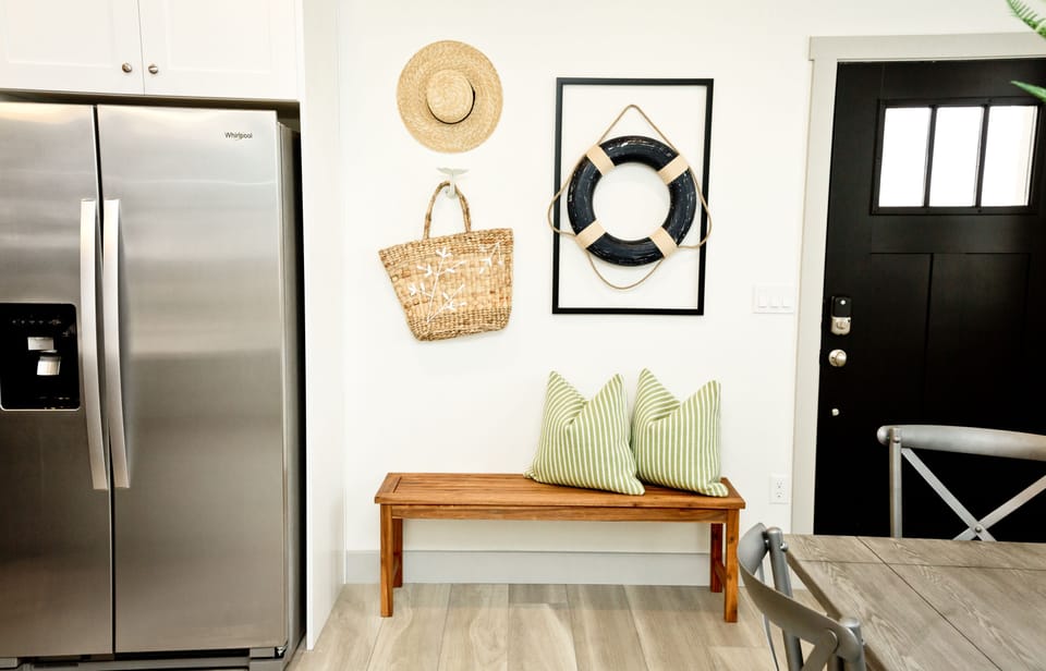 Welcoming entryway with quick access to the kitchen and main living areas.