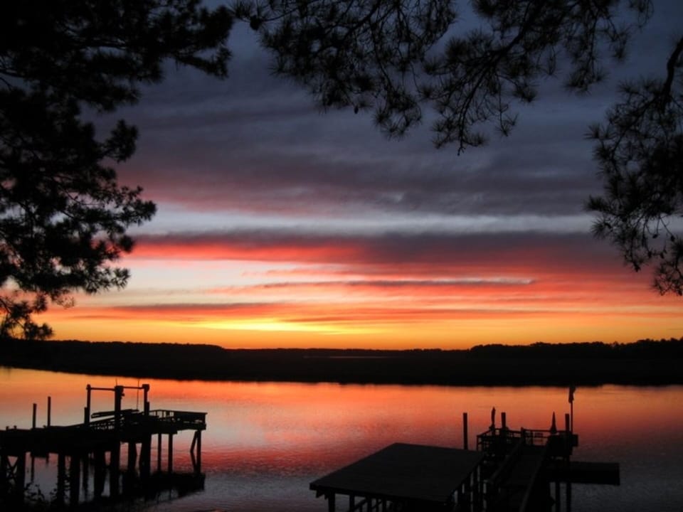 sunrise over Okatee RIver and cottage