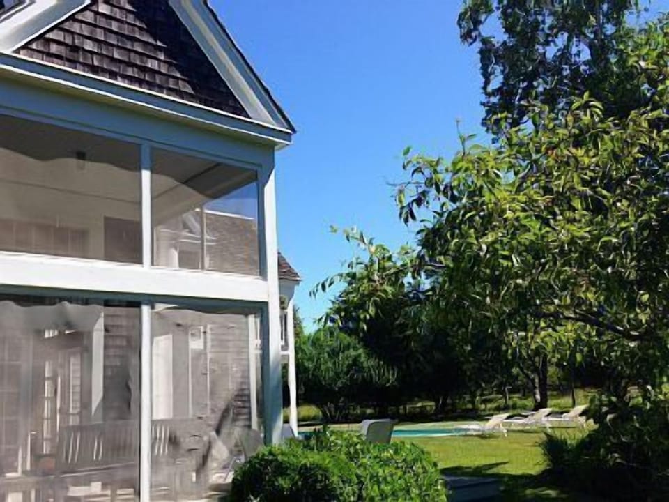 Screened Porch and backyard facing tree reserve