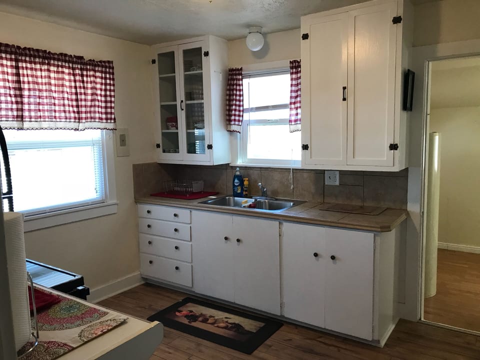 The kitchen is equipped with everything you'll need to cook your own meals