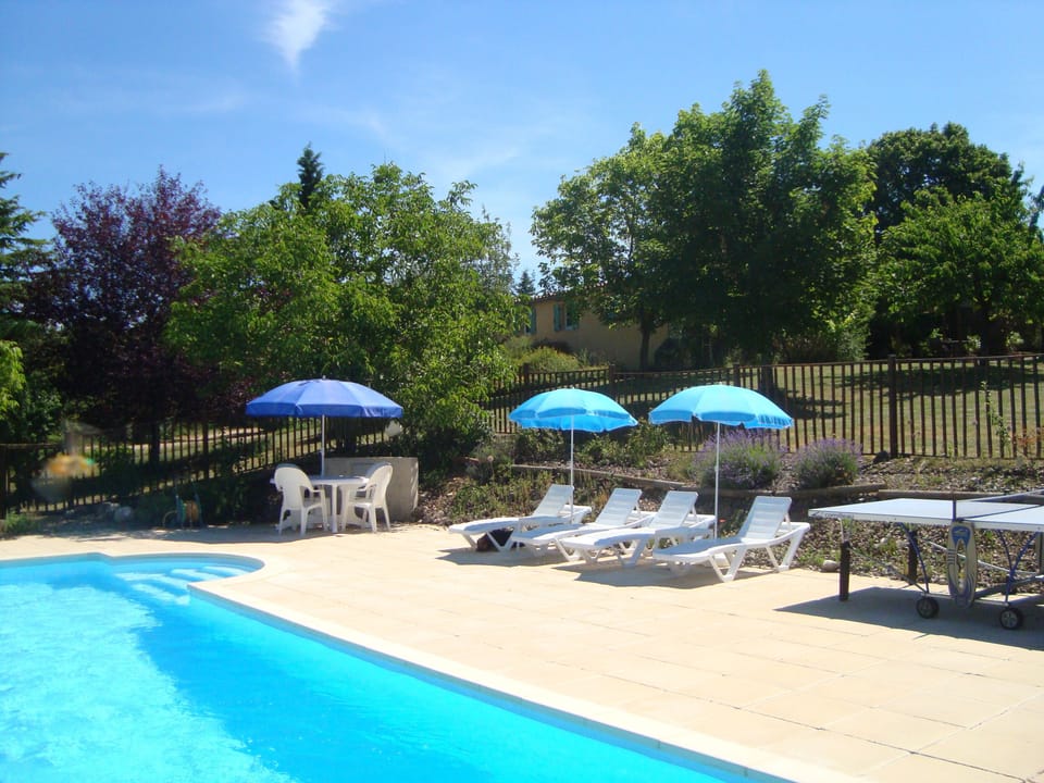 The pool, its terrace  with La Provençal above