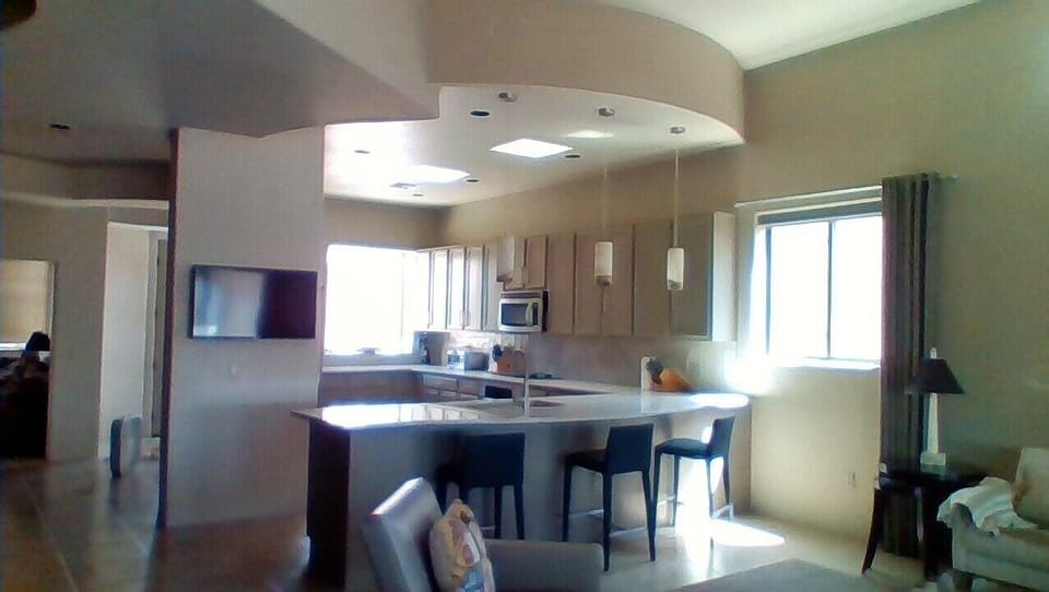 Huge remodeled kitchen. Catch the morning news at the breakfast counter. 