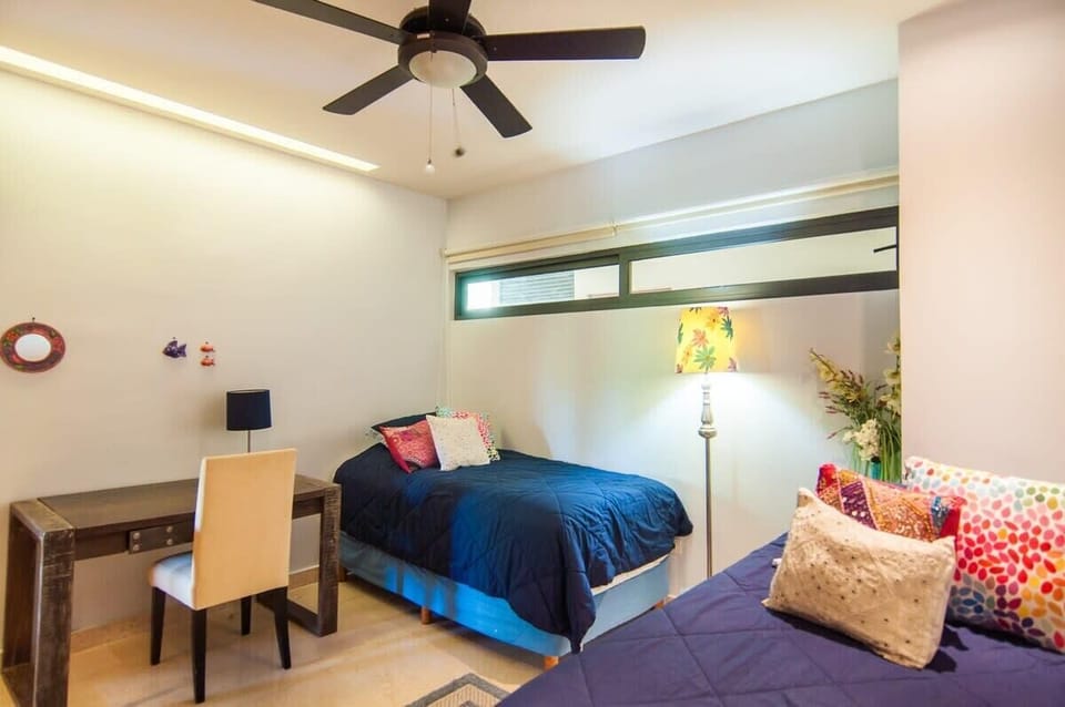 This space features 2 single beds