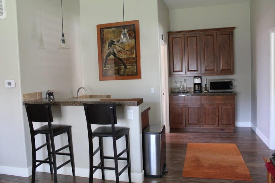 Kitchenette - includes small refrigerator, microwave, coffee maker & sink