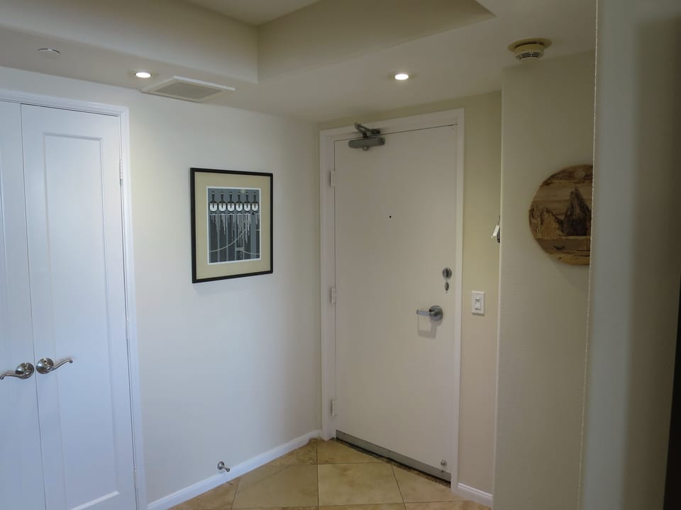 Front door with double doors to washer/dryer