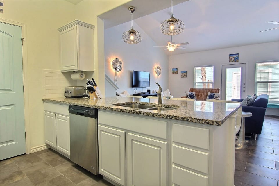 View of breakfast bar  and living room.