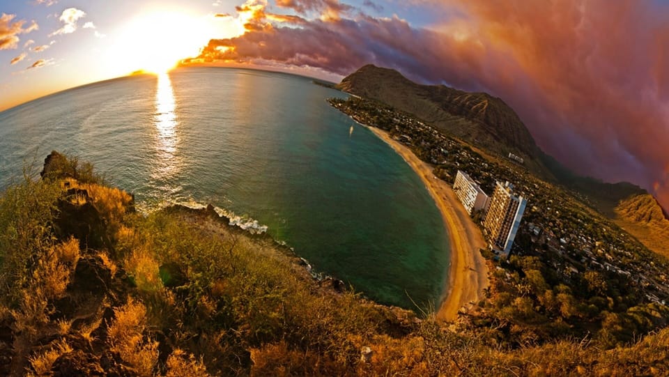 Sunset from Lahilahi, with the condo on the beach below