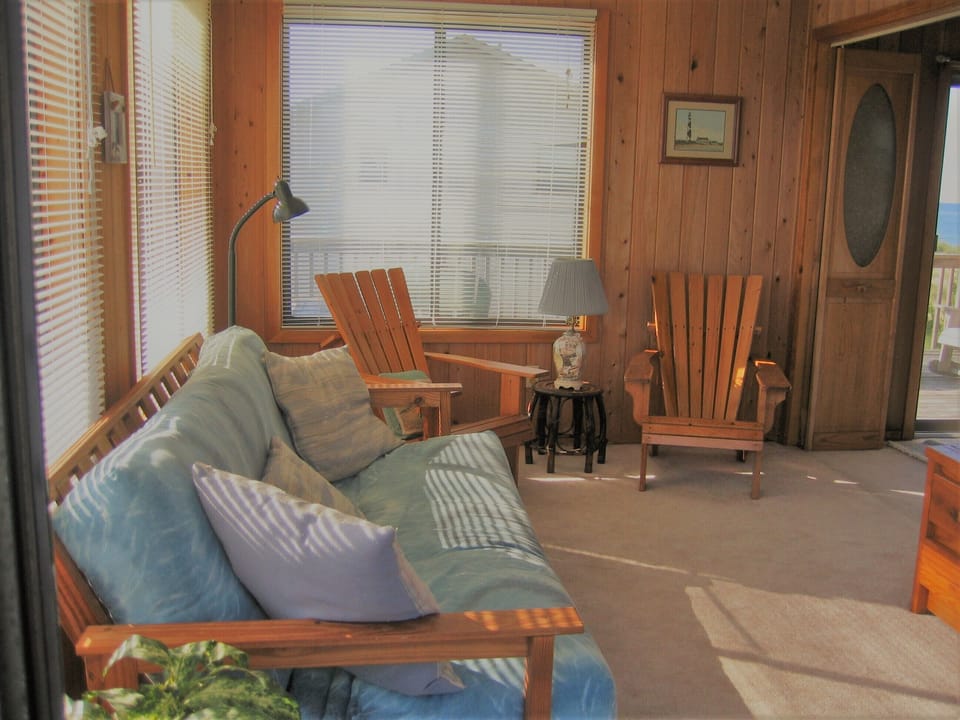 Den with queen futon.