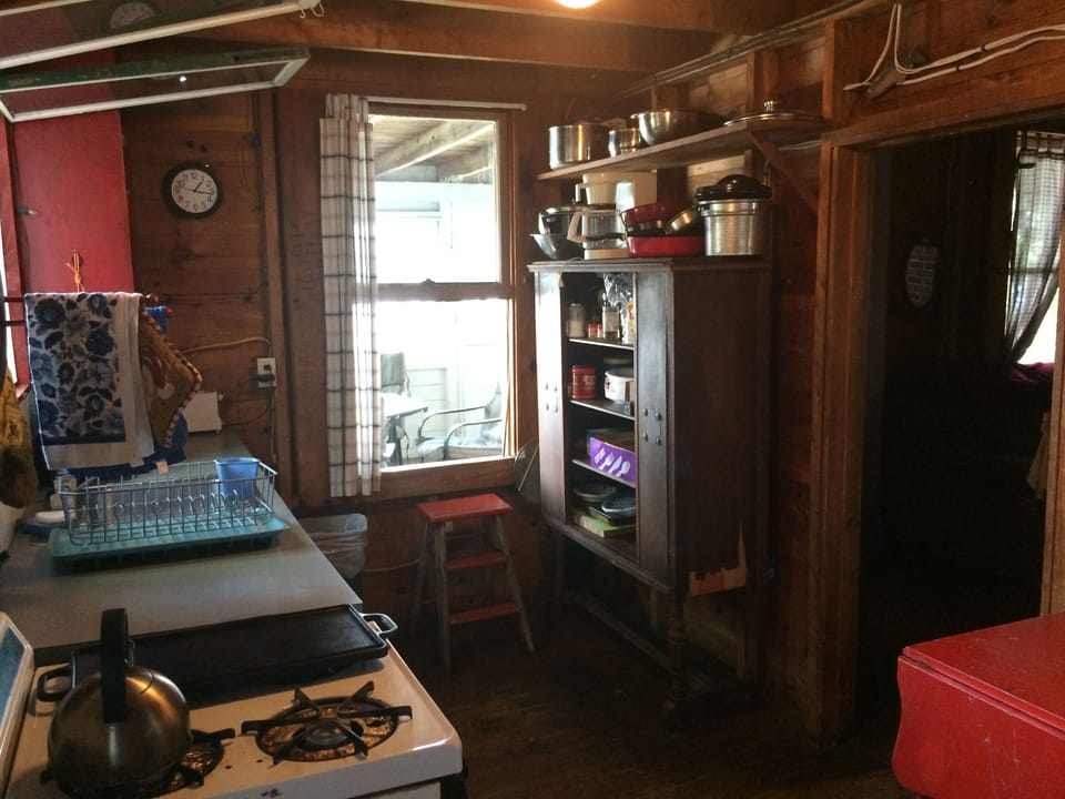 entering camp-the kitchen. window opens to screened porch