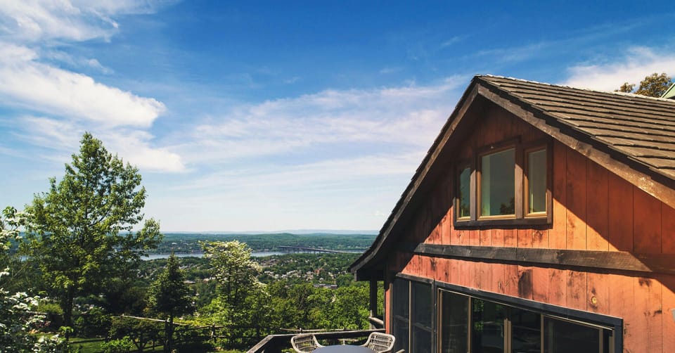 The south deck features seating and a Weber grill to enjoy the view outdoors.
