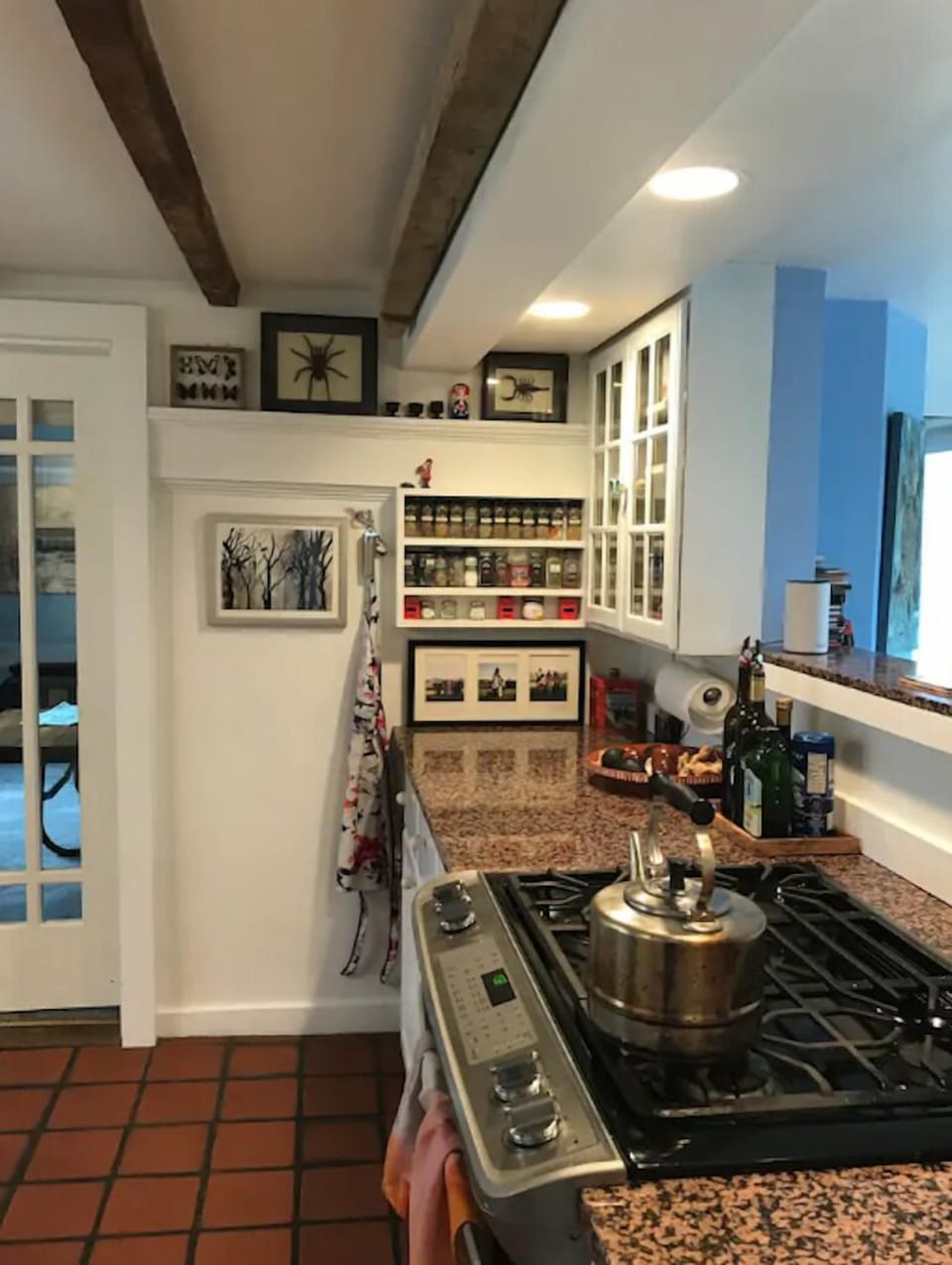 Kitchen, library room off to the side, fully stocked
