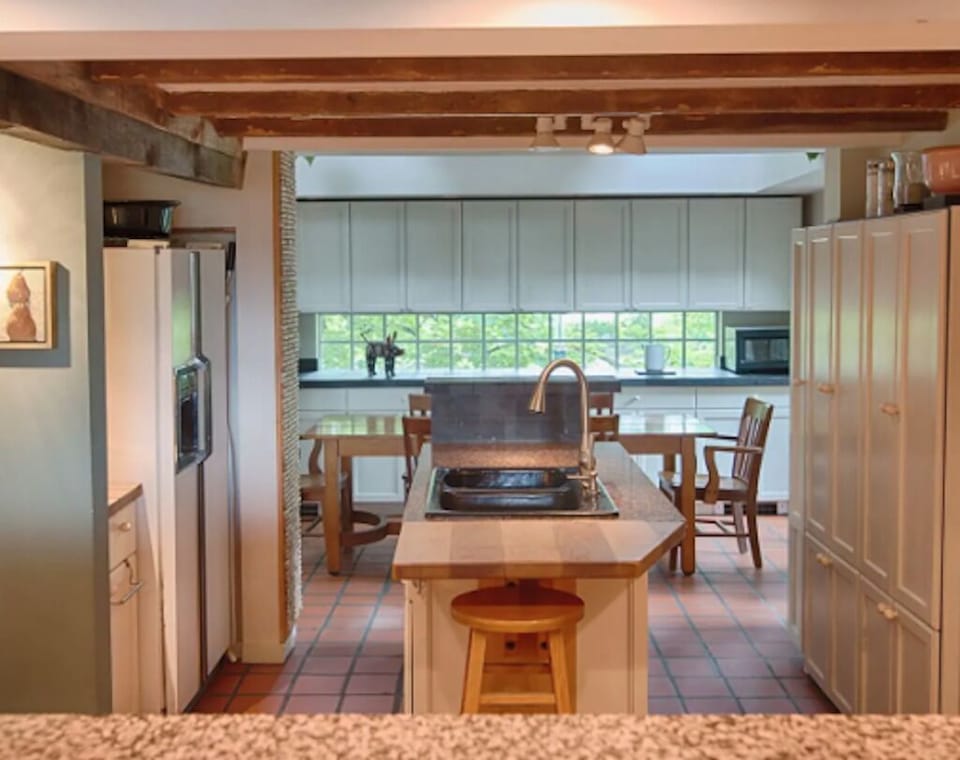 Kitchen, view into second dining room, garden dining room