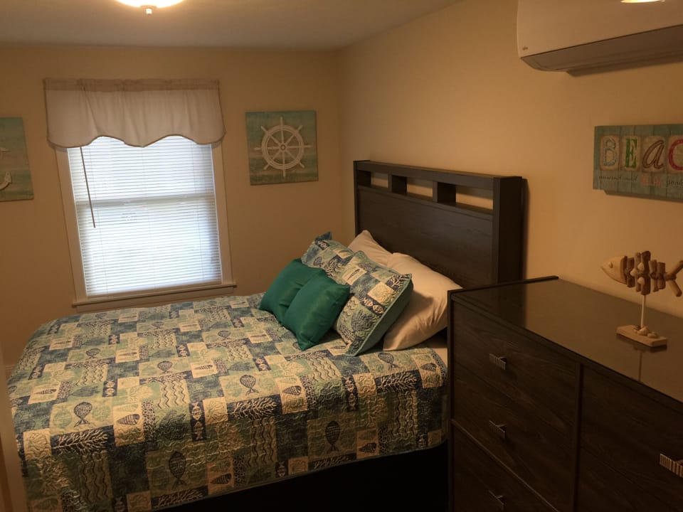 Queen bedroom with flat screen tv