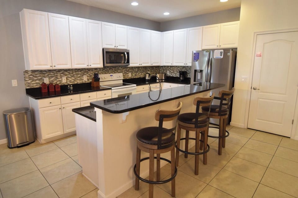 Fully-equipped kitchen with breakfast island