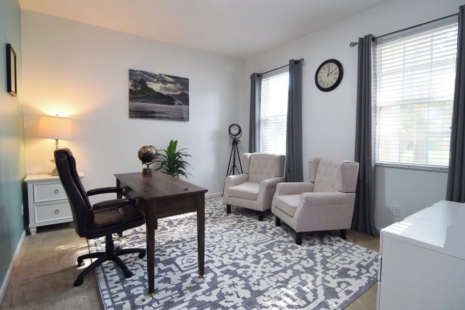 Third living space is a den/office with Smart TV