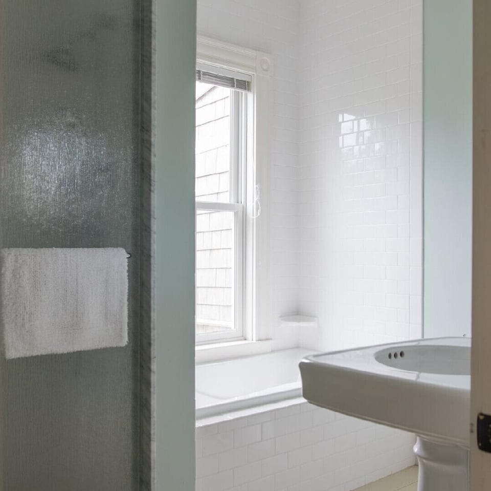 BATHROOM WITH TUB AND SHOWER