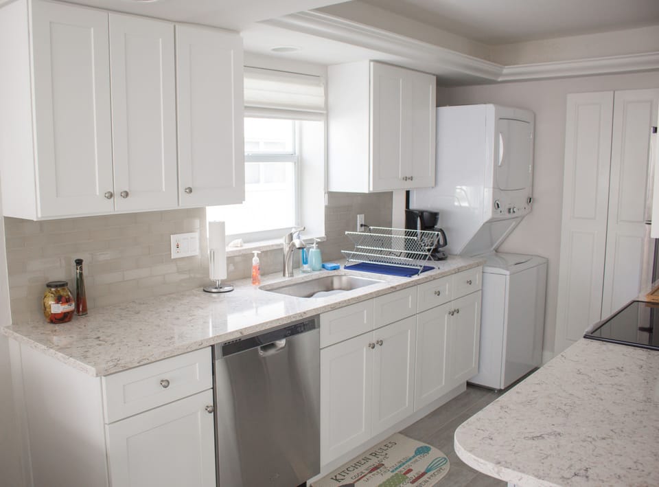 Newly remodeled kitchen including new tile floors throughout. 