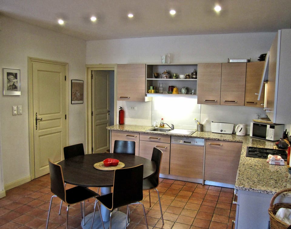 Well equipped kitchen and dining area area of open plan living room.
