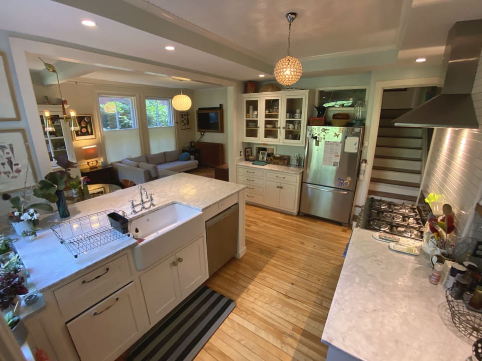 Open to the family room and television area, the kitchen is a favorite hangout