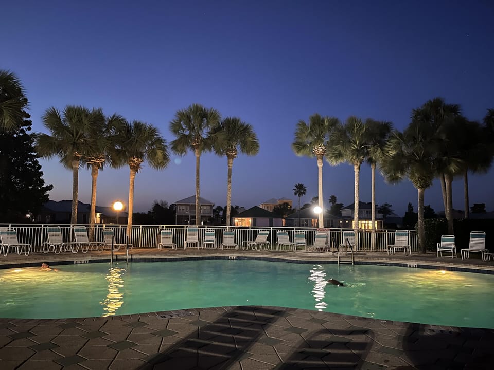 Unwind with a peaceful evening swim in the seasonally heated North Pool — a favorite spot for winter guests.