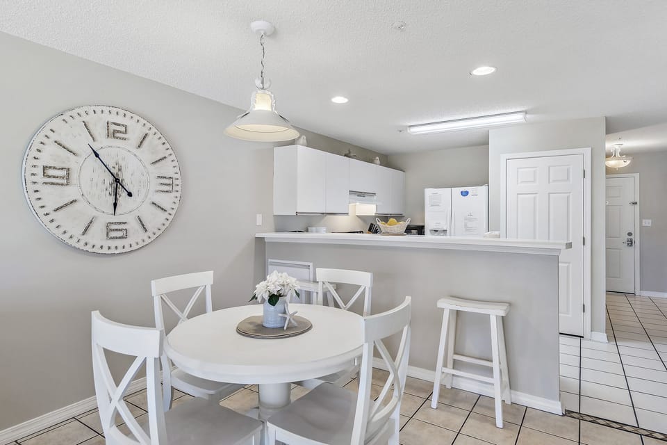 Dining Table Seats Four, plus Additional Counter Seating.'