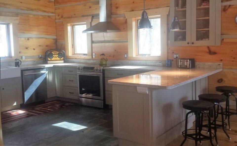 Modern kitchen, granite counters, slate floor