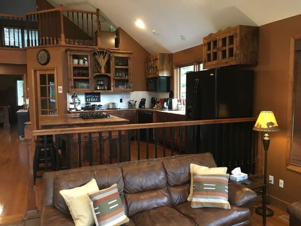 Living room looking into open kitchen
