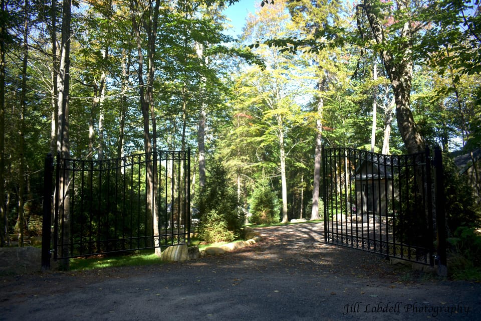Front gated entrance and private drive leading to the Bear's cottage.