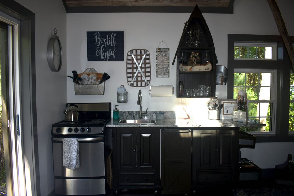 Fully equipped functional kitchen area.