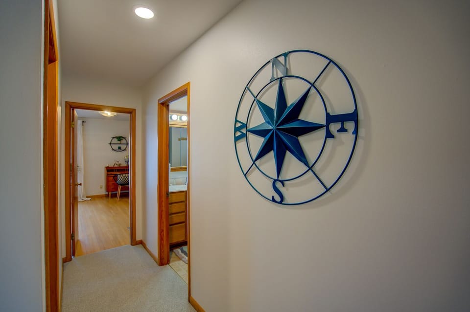 Upper hallway between bedroom and bathroom.