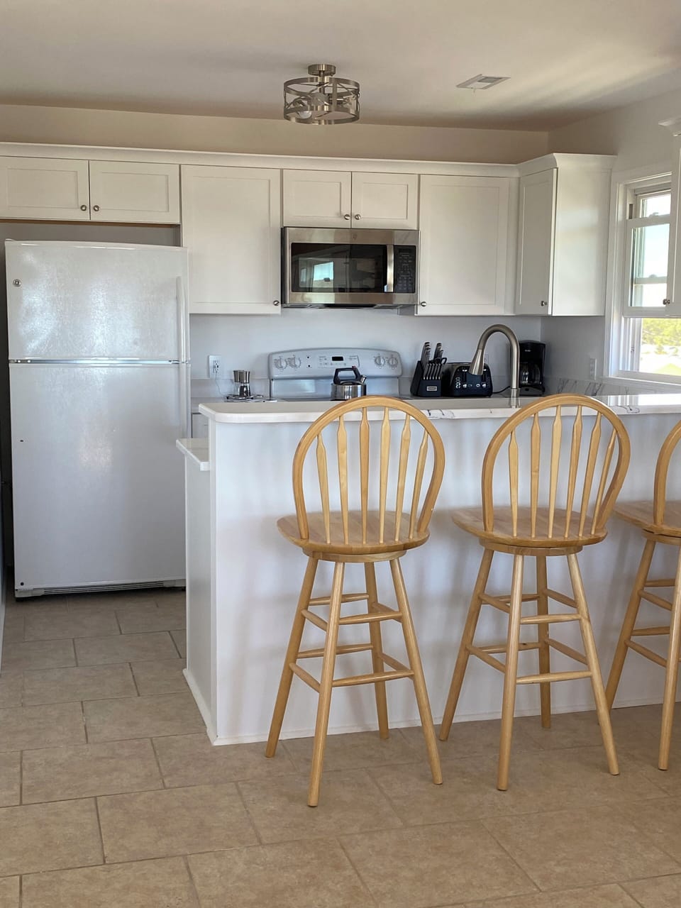 Kitchen with service for eight.