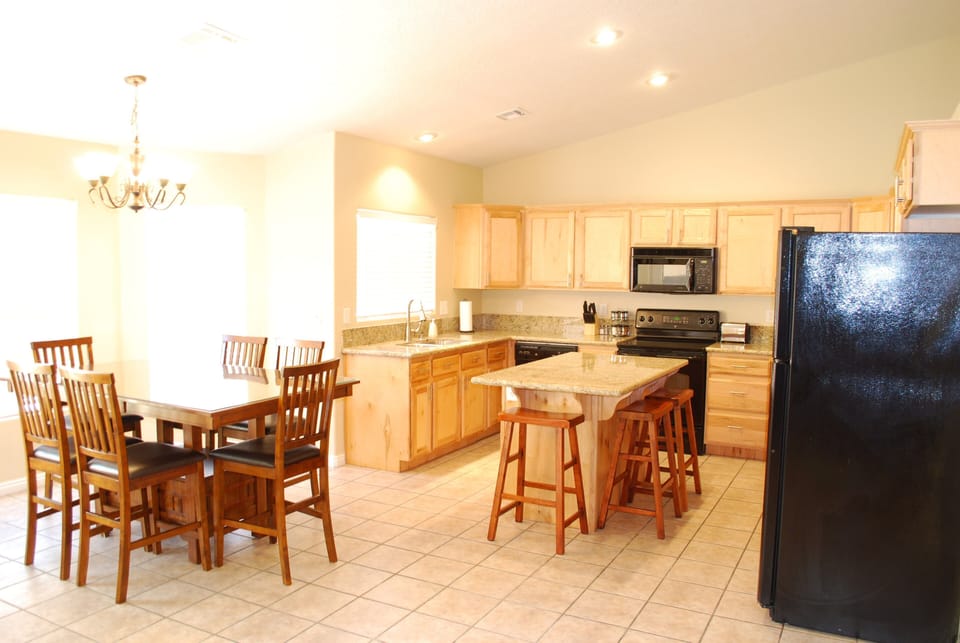 Nicely supplied kitchen with all the small appliances.
