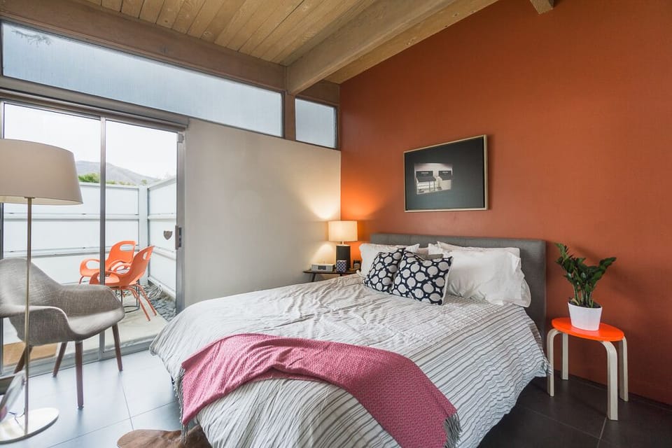 Bedroom 2 with queen size bed and patio access