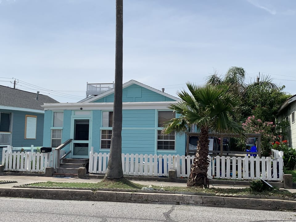 Big deep beach across the street with lifeguard/Deck/see water/Pelicans/walk all