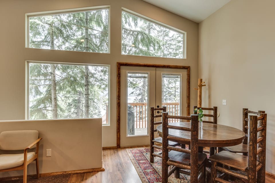 sit down dining area off kitchen and bar of 2nd living quarters. large windows