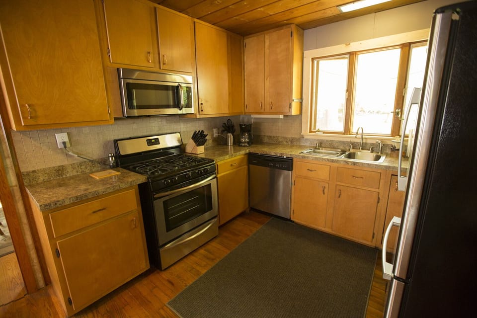 Palmer House kitchen with new stainless steel appliances.