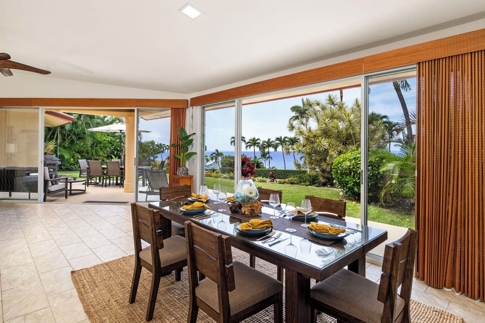Enjoy meals with a stunning ocean view through floor-to-ceiling windows, where tropical breezes and lush gardens create an unforgettable dining atmosphere.
