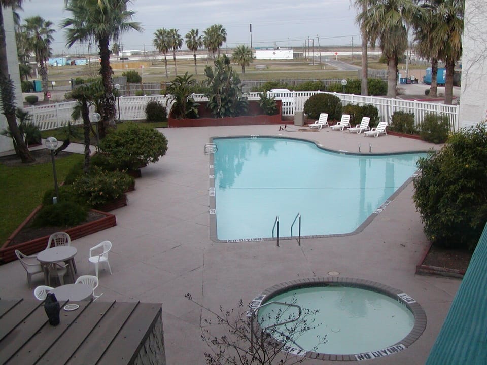 Largest of two swimming pools on property