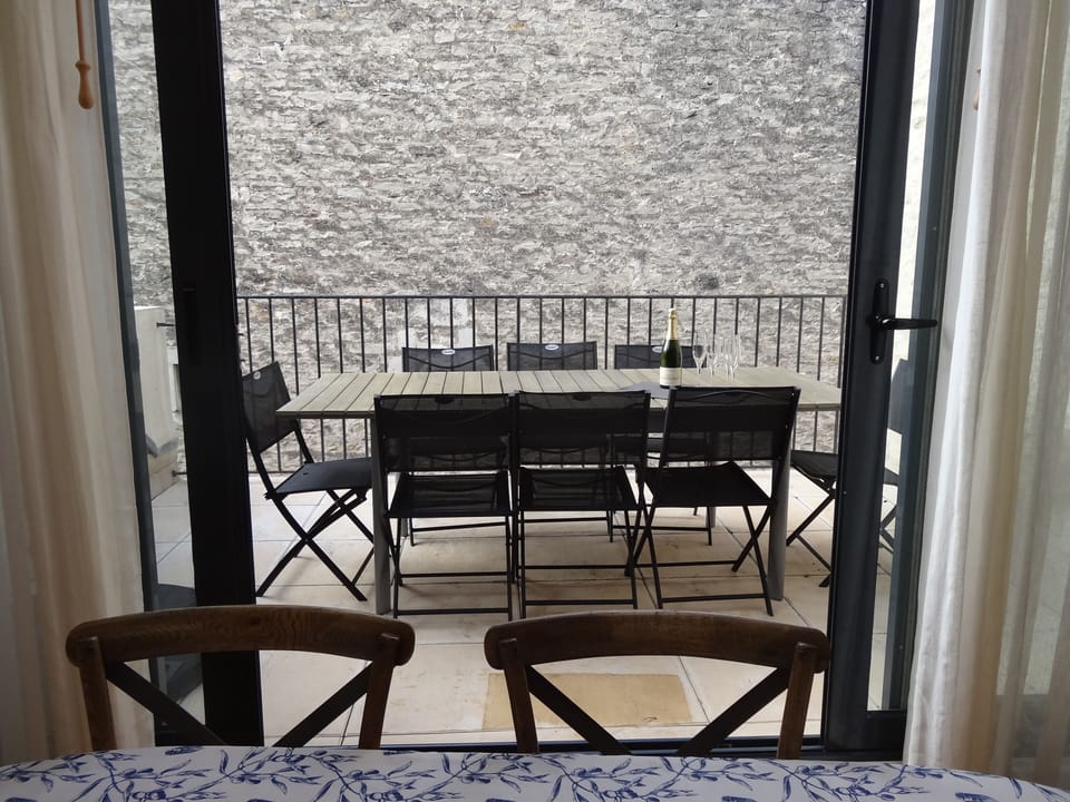 Terrace dining, not showing is a large sun umbrella and an electric b-b-q.