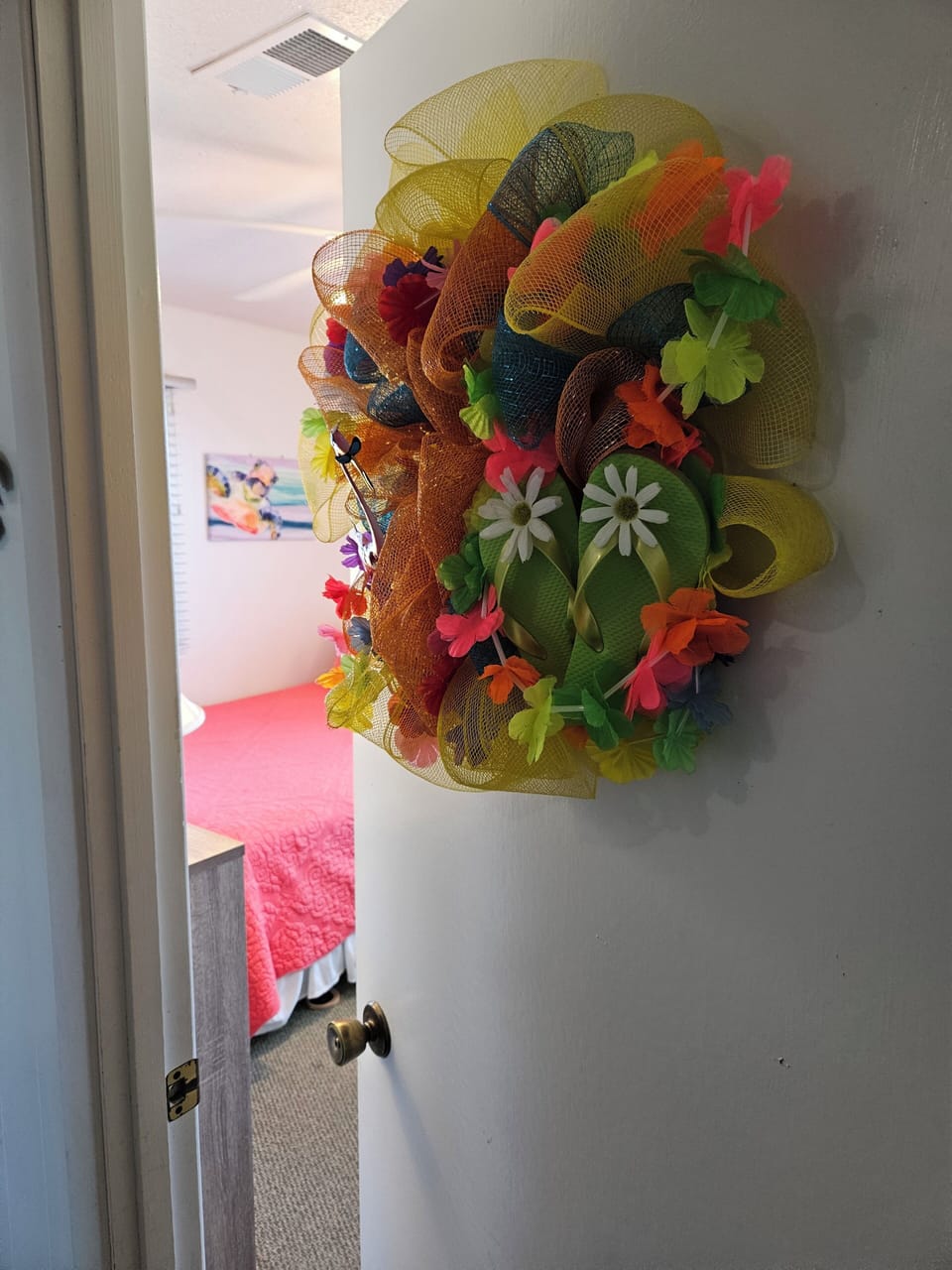 Entrance to 2nd bedroom, decorated in whimsical beach colors