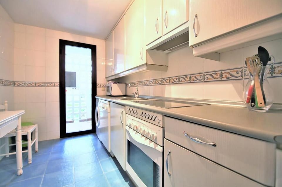 Kitchen is fully equipped with all the appliances and small terrace to the rear