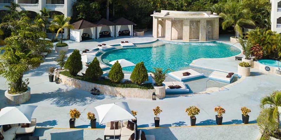 beautiful pool area is just below your room