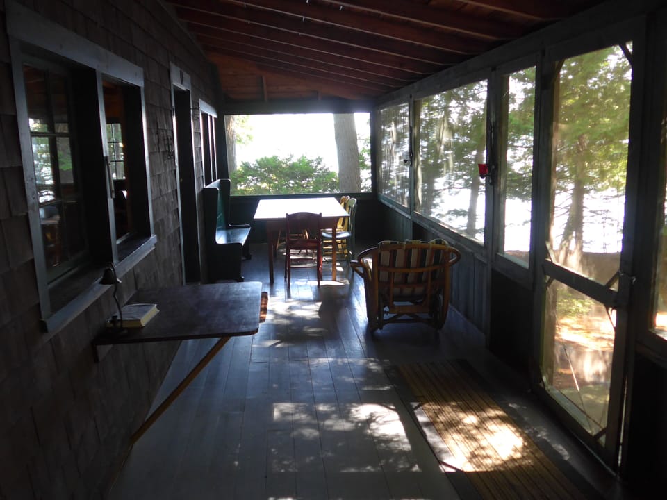 Buildings Connected by Large Screened in Porch