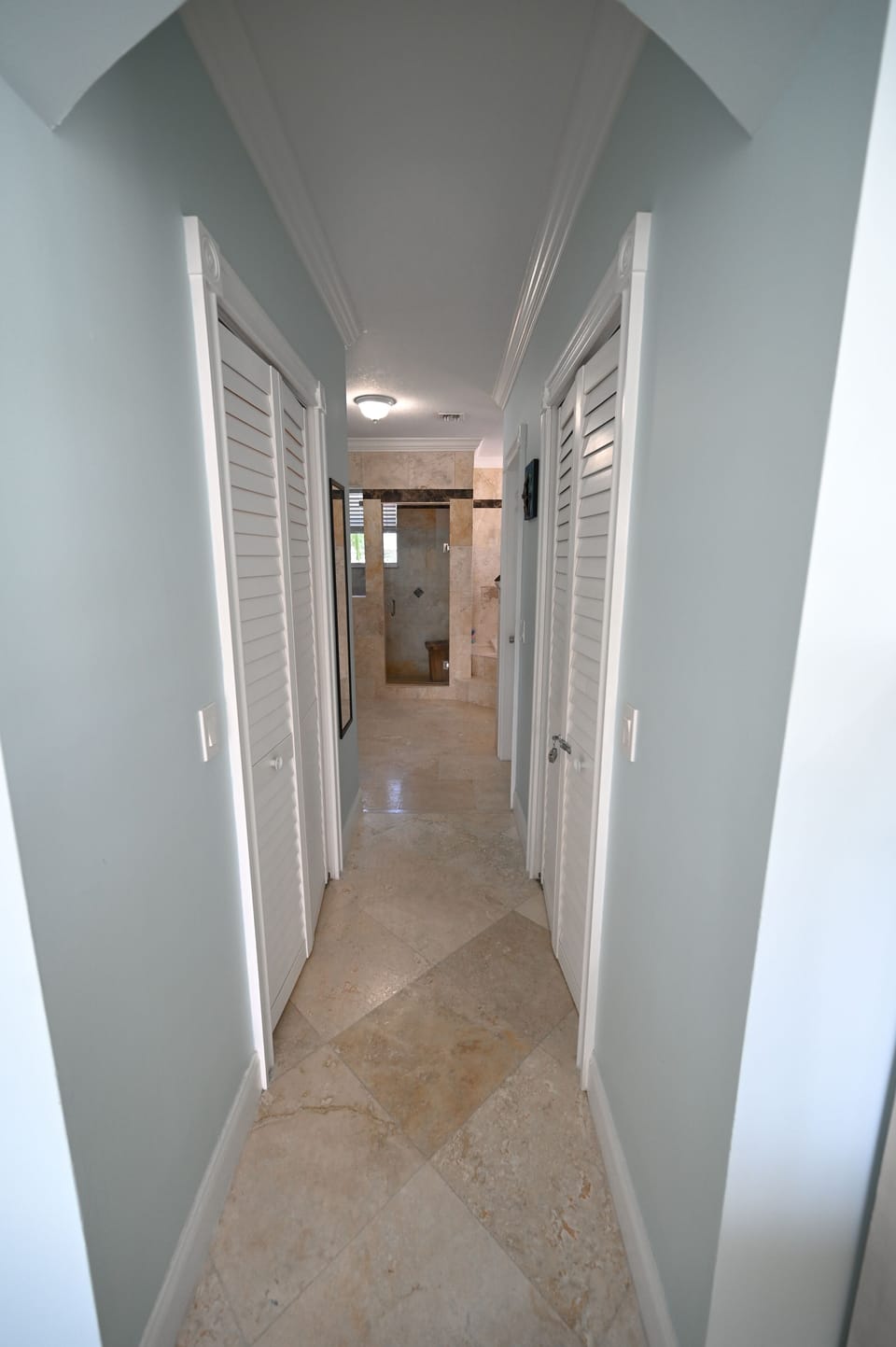 Hallway to w other 2 rooms. It