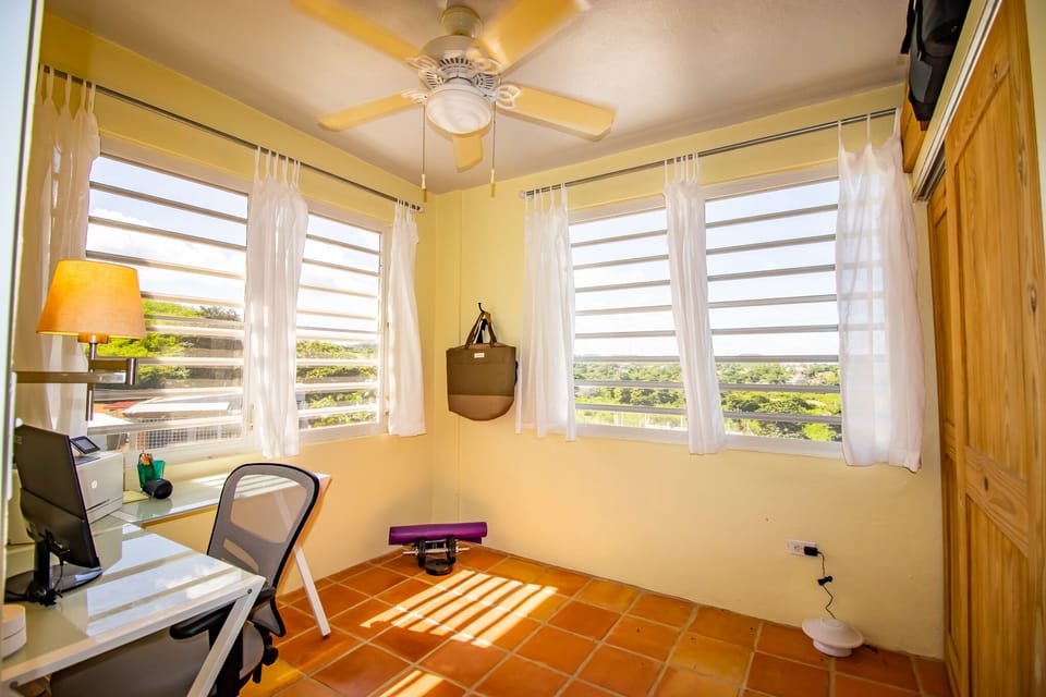 Upstairs office, exercise area and laundry