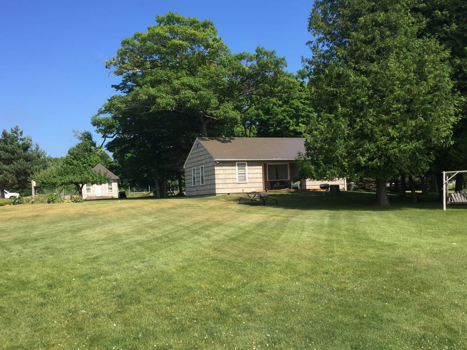 View from the shore to the cottage 