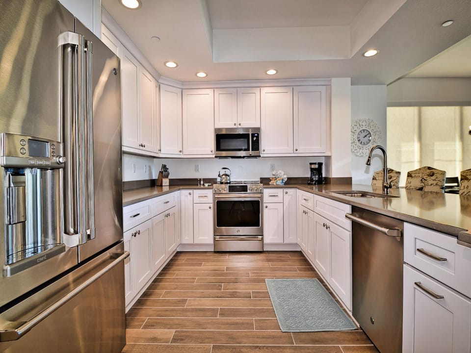 Stainless steel appliances; Induction range, dishwasher, fridge and microwave.