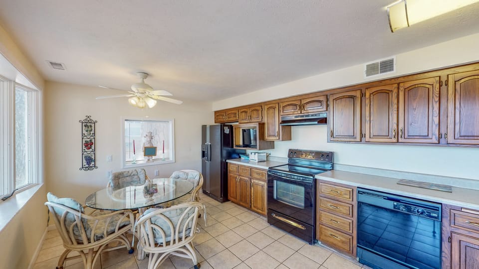 Kitchen with dining table on lower level