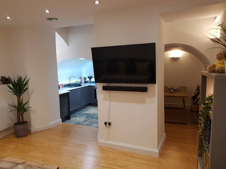 50 inch TV, dining and kitchen